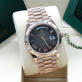 Rolex Day-Date Everose Slate Roman - 228235 - 03/2026 - New and Unworn - Full Set