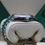 Rolex Datejust 41 Grün Motif - 126334 - LC100 02/2023 - Neuwertig/Teilverklebt - Discontinued - Full Set